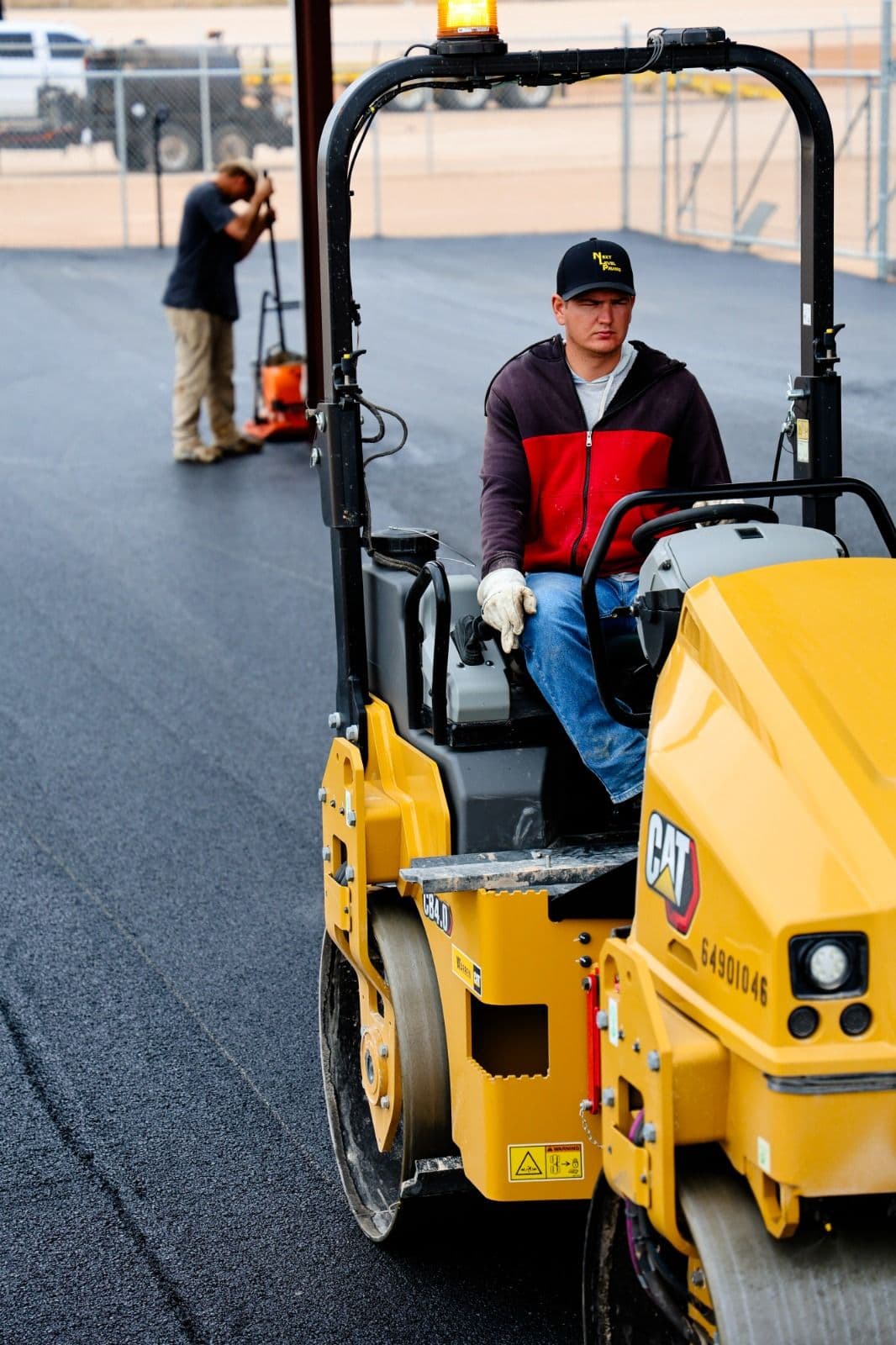 Road compaction equipment used by Next Level Paving